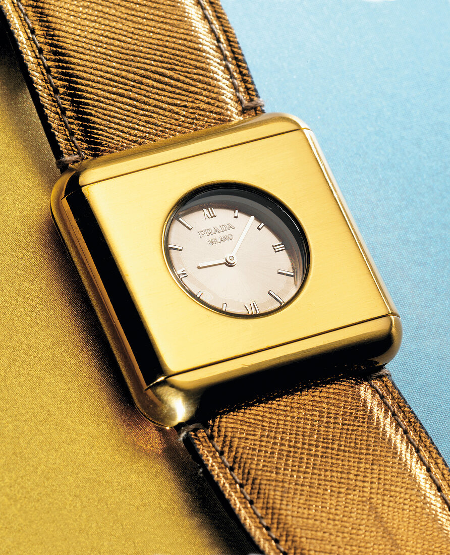 Close-up of golden wrist watch