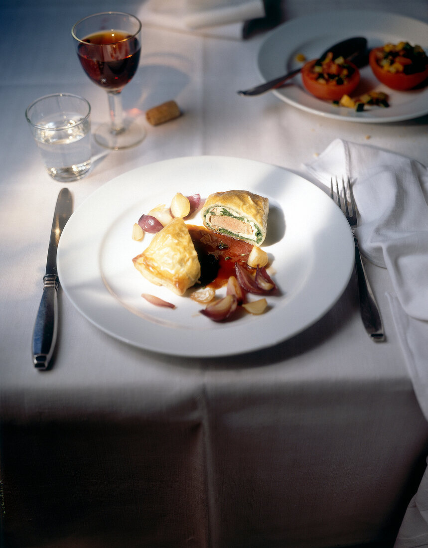 Lamb chops in puff pastry on plate