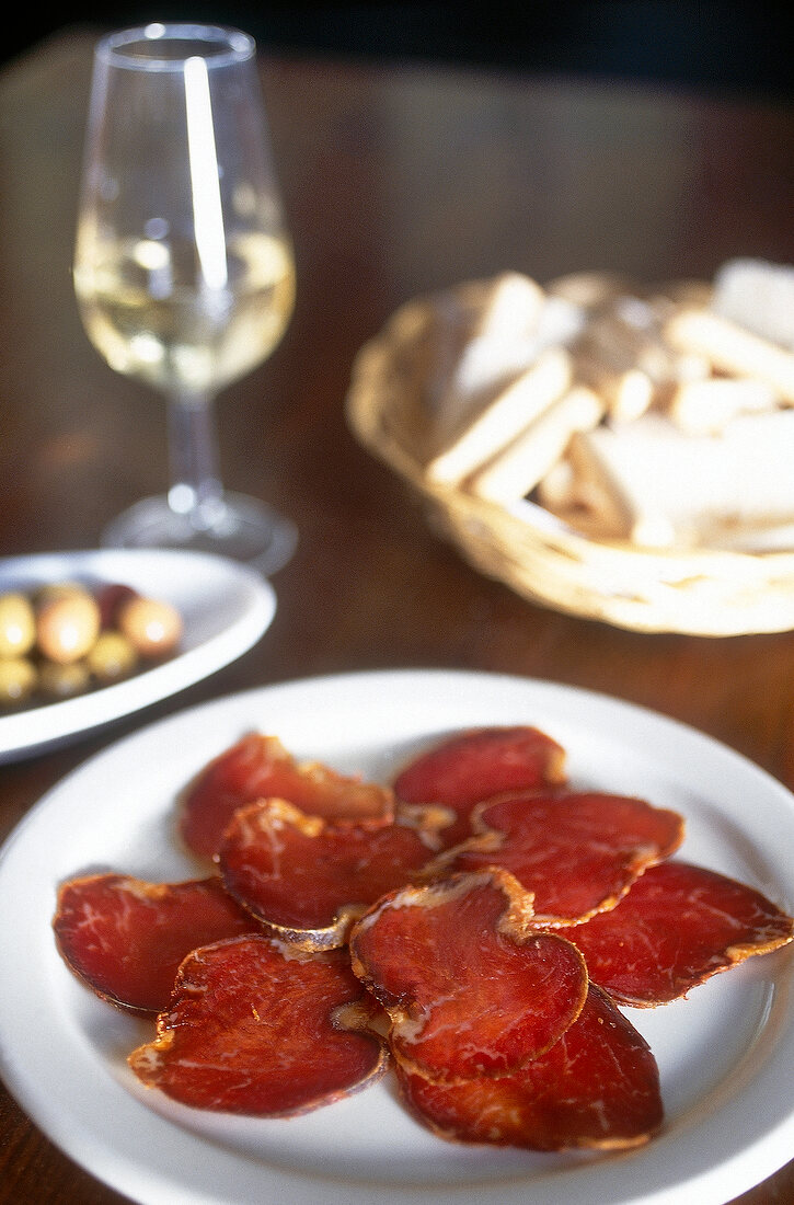 Raw spanish ham from Jerez on plate