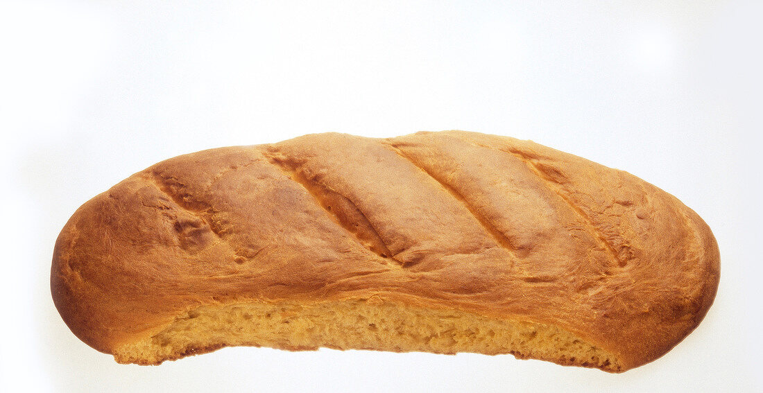 Close-up of pumpkin bread on white background