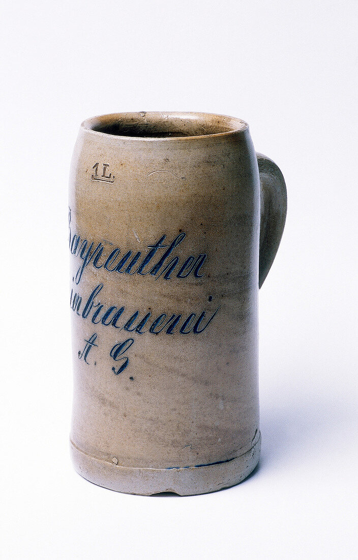 Historical stein from Franconia on white background