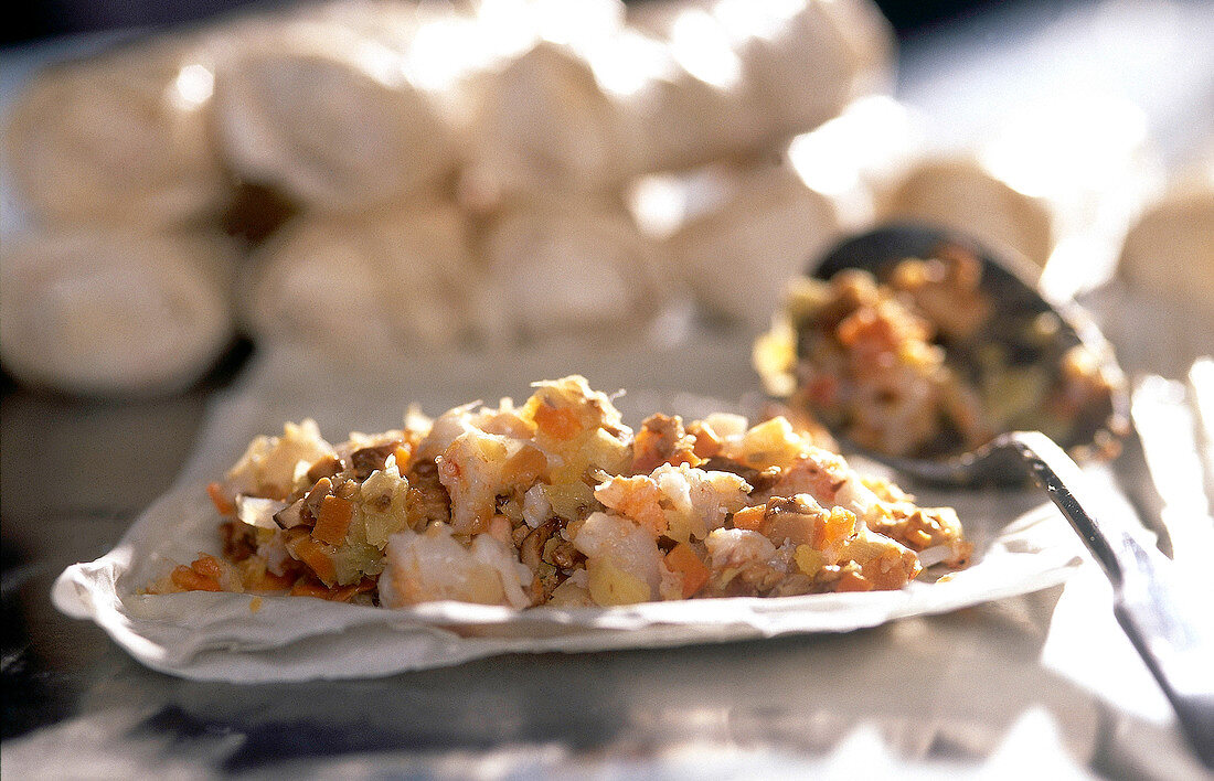 Close-up of California lobster strudel with fresh corn
