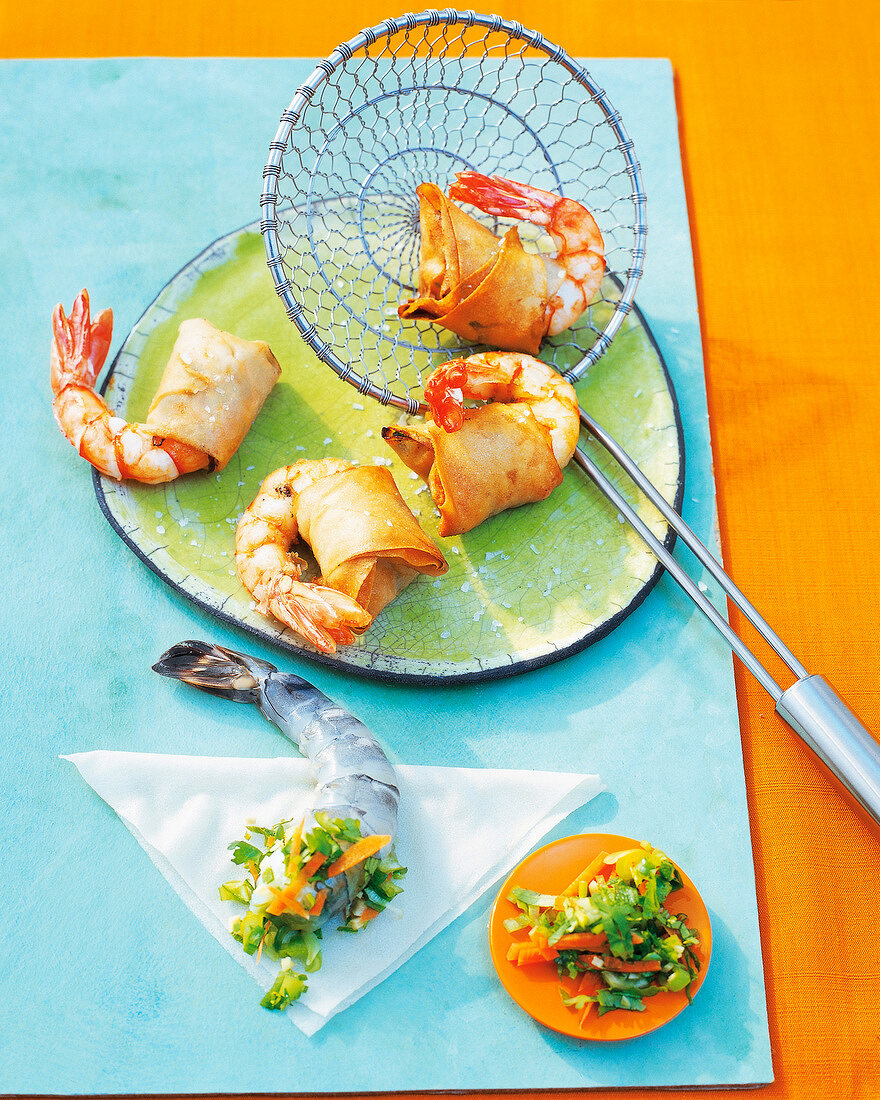 Cooked Asian shrimp with vegetables on plate