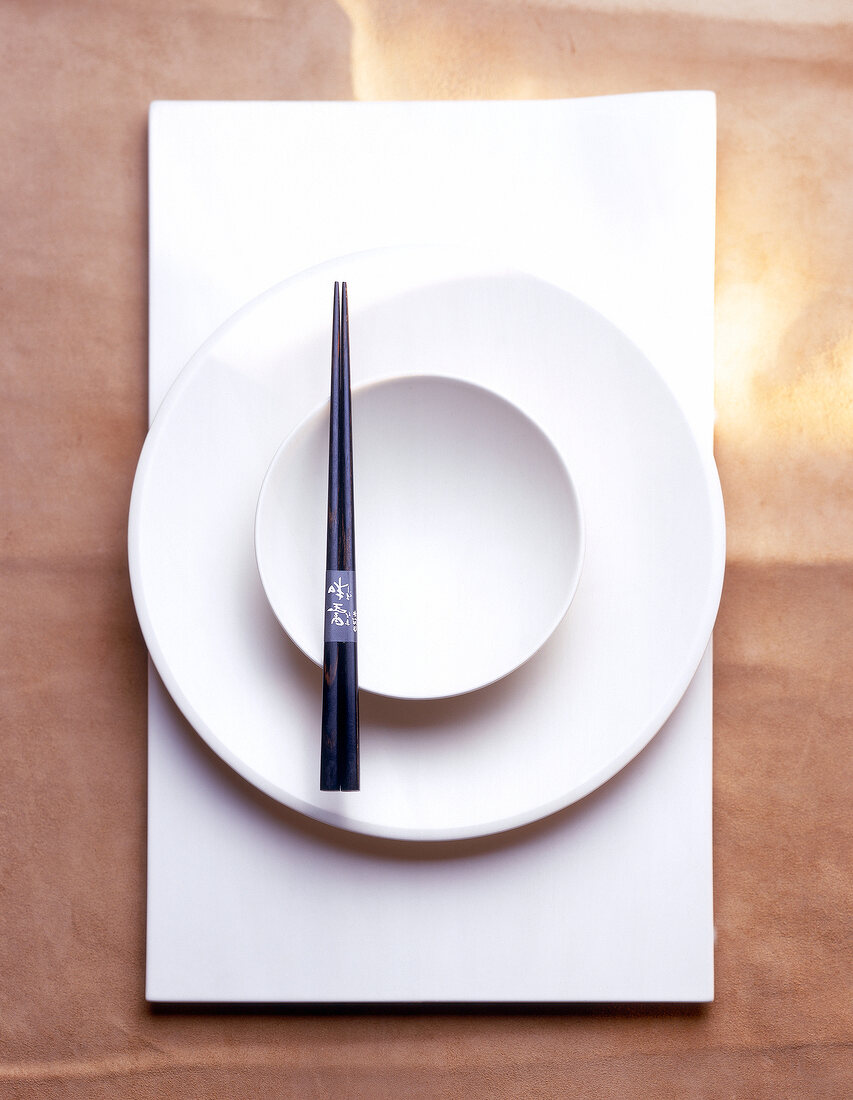 Ceramic sushi set consisting of plate, bowl and chopsticks