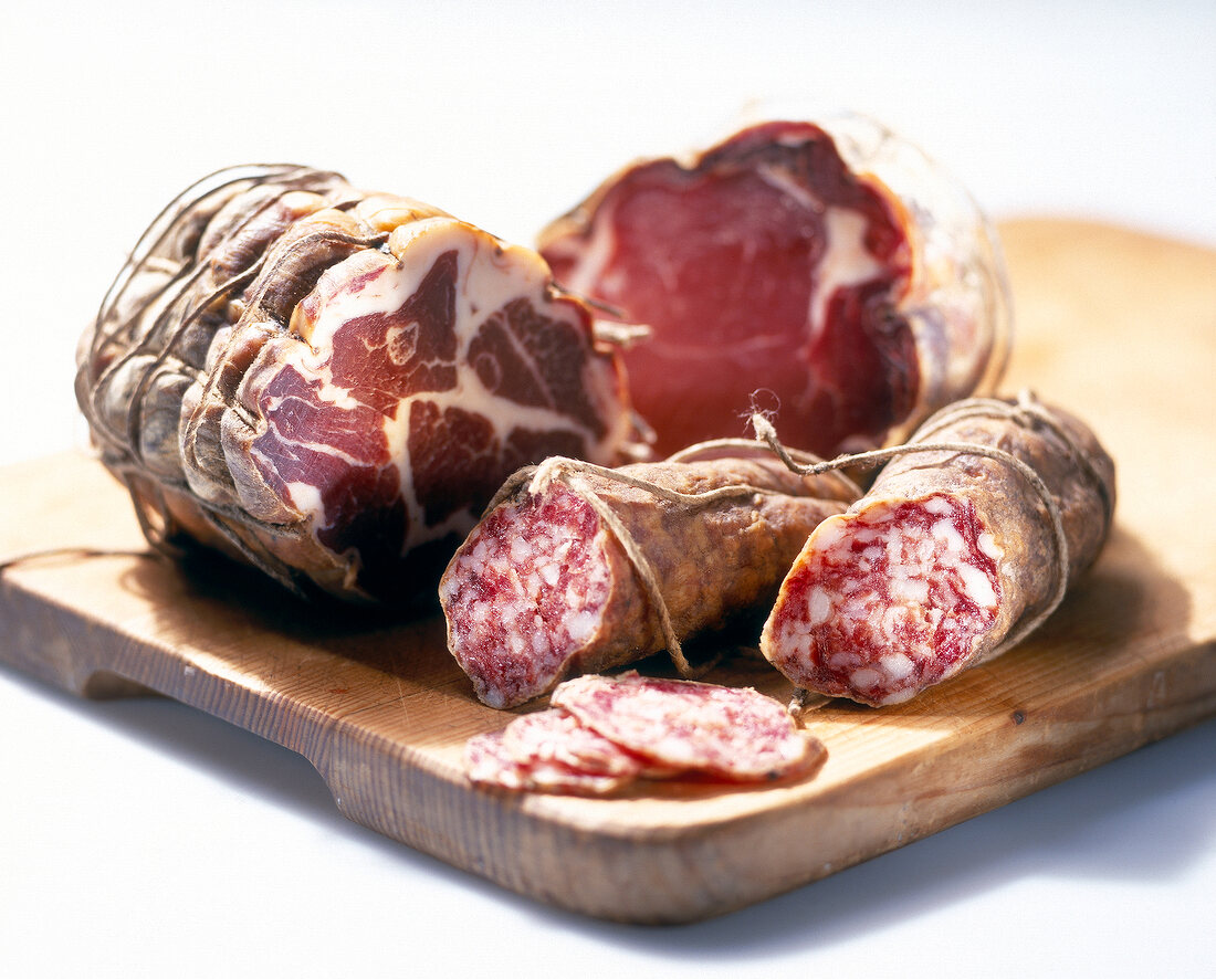 Different parma ham on cutting board