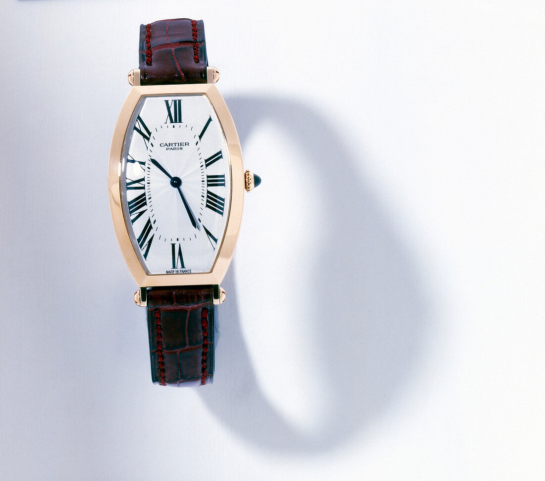 Close-up of wrist watch on white background