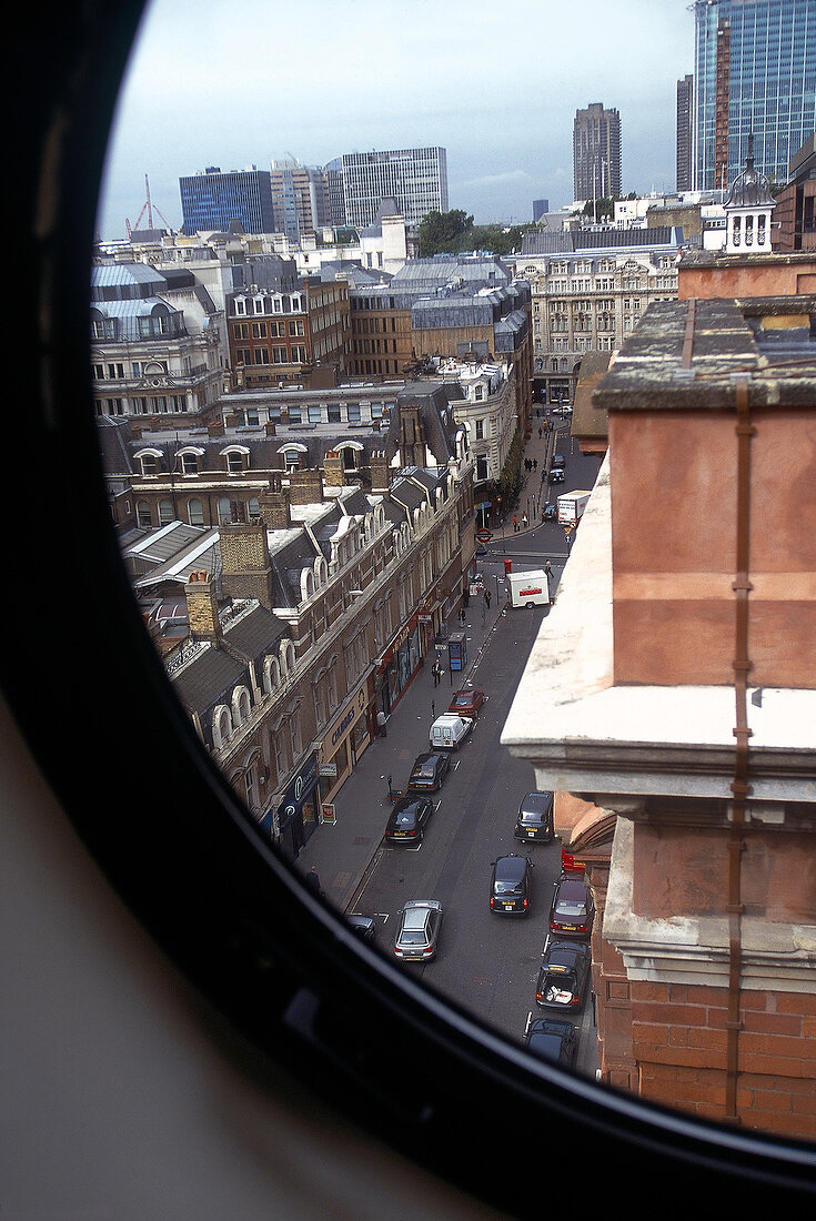 View of Great Eastern hotel and street through window, London