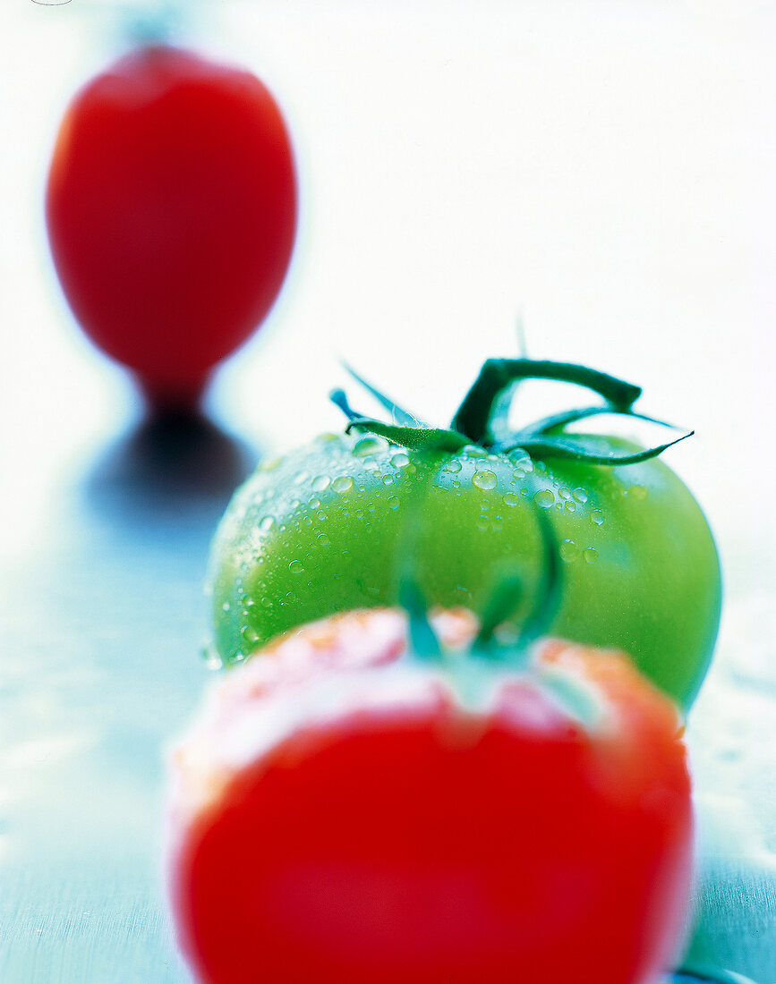Close-up of green and red tomato