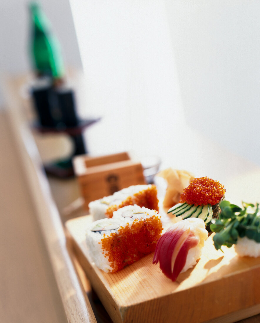 Sushi on wooden board