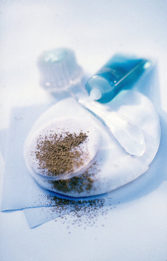 Close-up of mattifying gel and powder for make-up