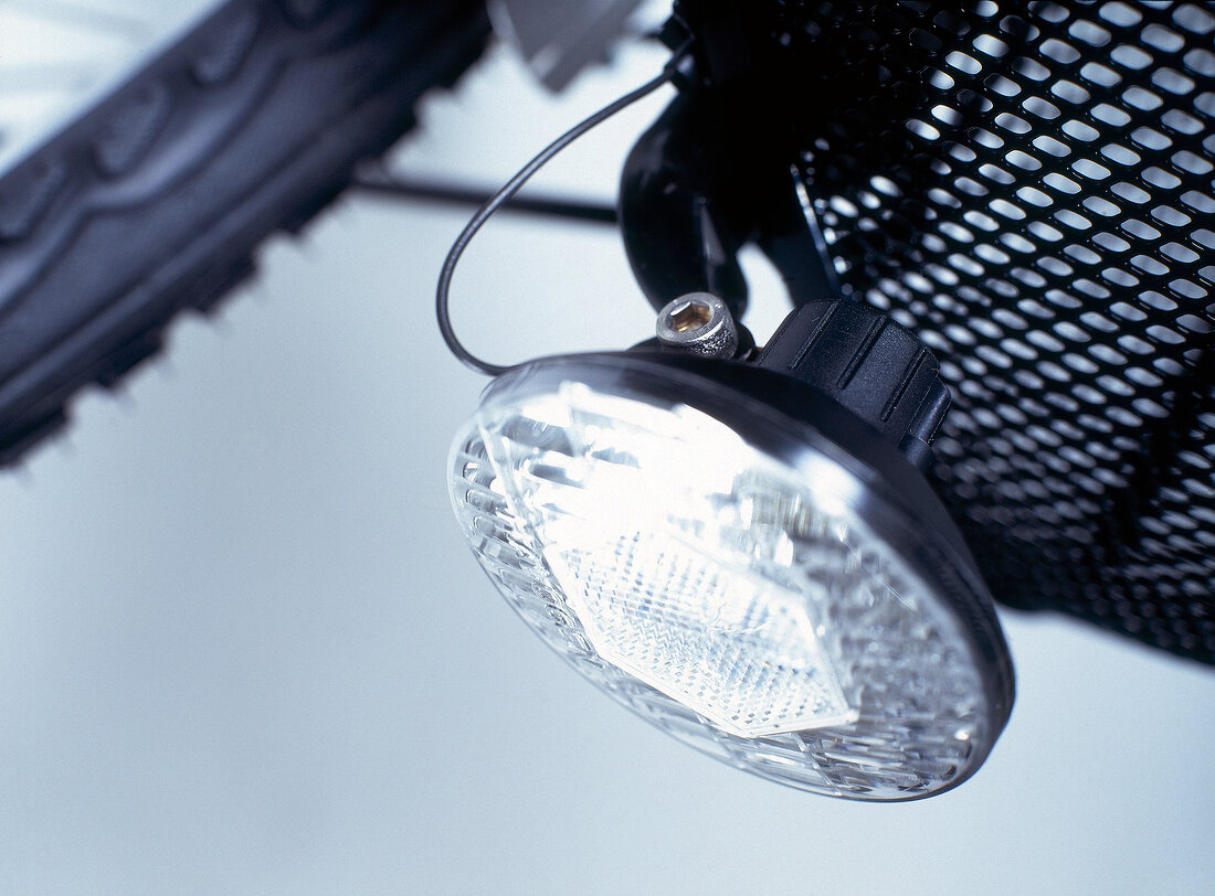 Close-up of halogen lights on touring bike