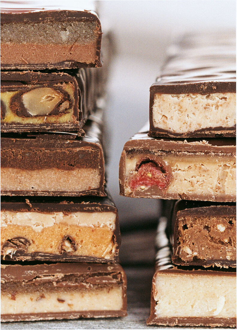 Close-up of different stacked chocolate bars