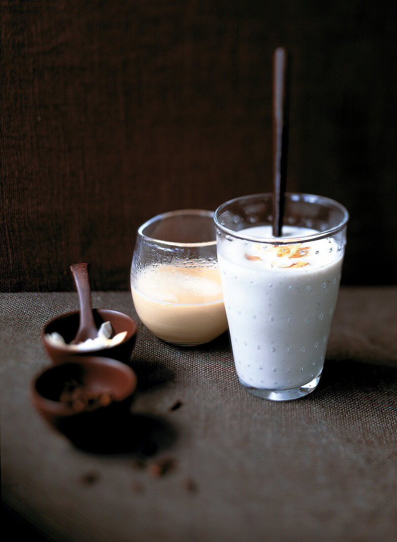 Rooibos tea and warm coconut milk with vanilla in glasses