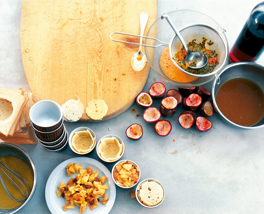 Preparation of apple charlotte with passion fruit sauce, elevated view