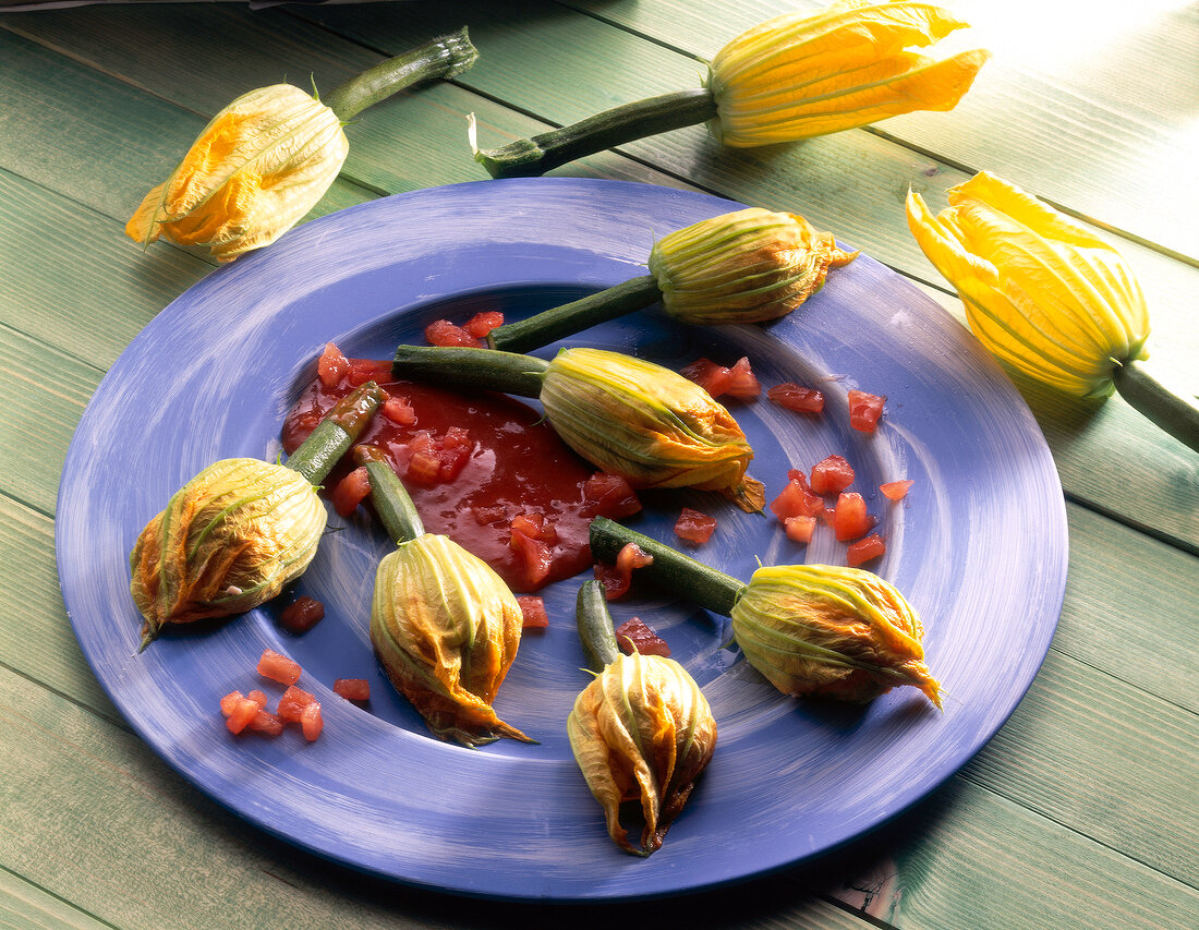 Stuffed courgette flowers on plate