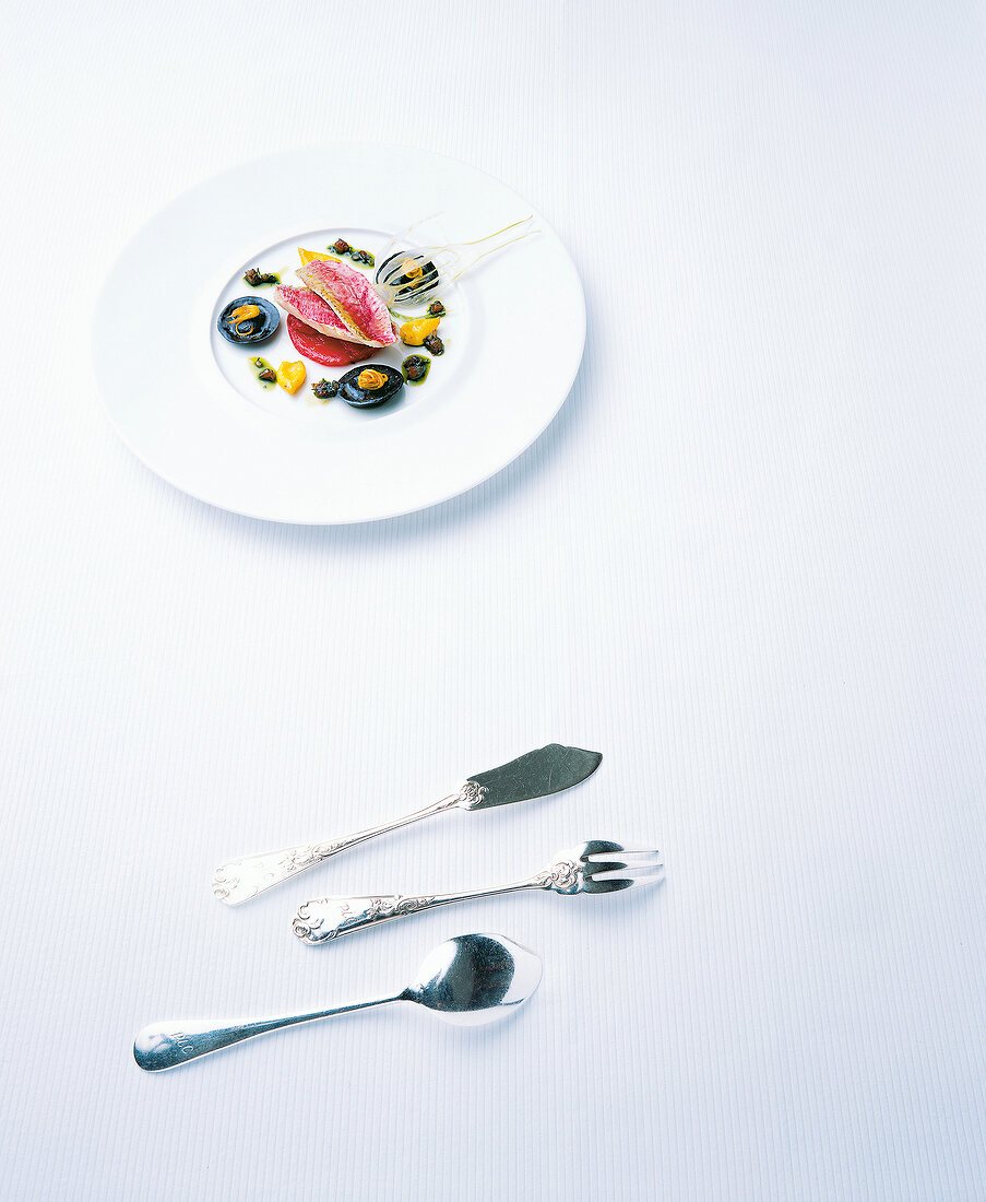 Red mullet with fennel ravioli on a plate