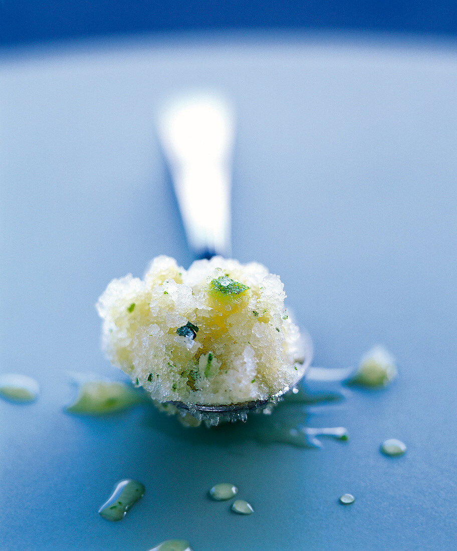 Close-up of Italian mojito on teaspoon