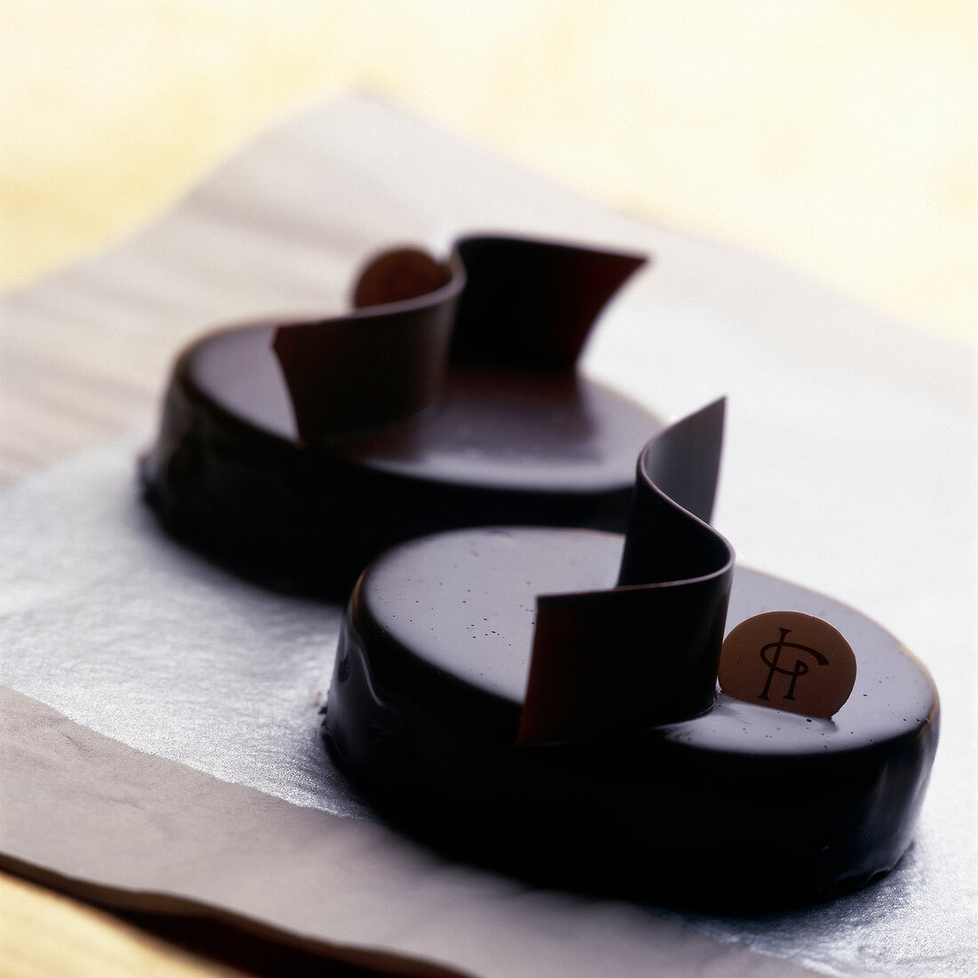 Close-up of two fine French chocolates