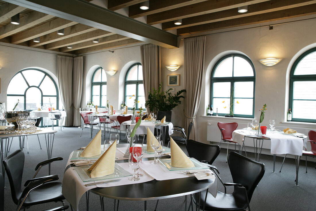 Tables laid in restaurant, Germany