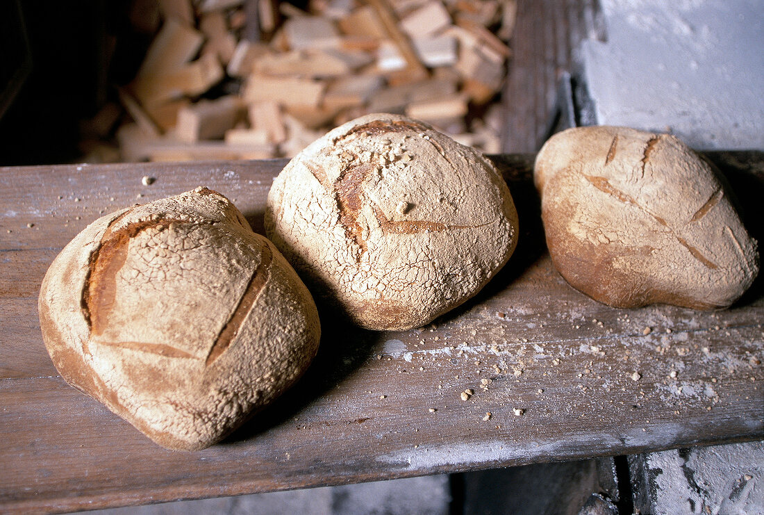 Brotlaiber bread fresh from the oven on wooden surface