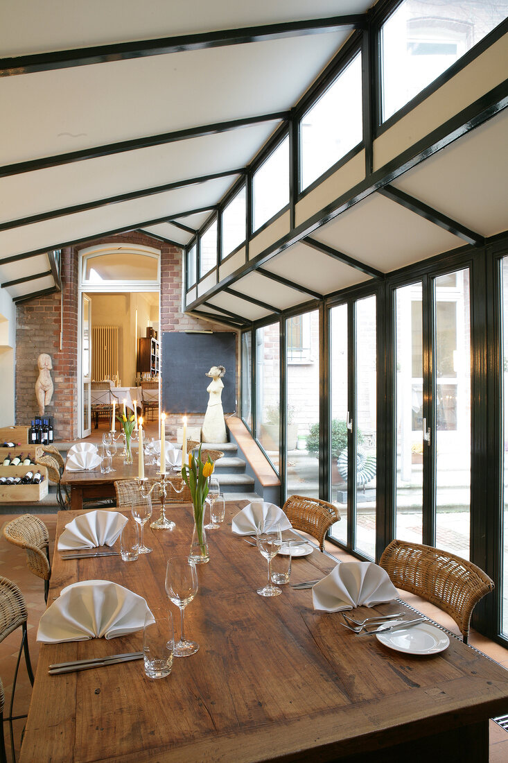 Tables laid in restaurant, Germany