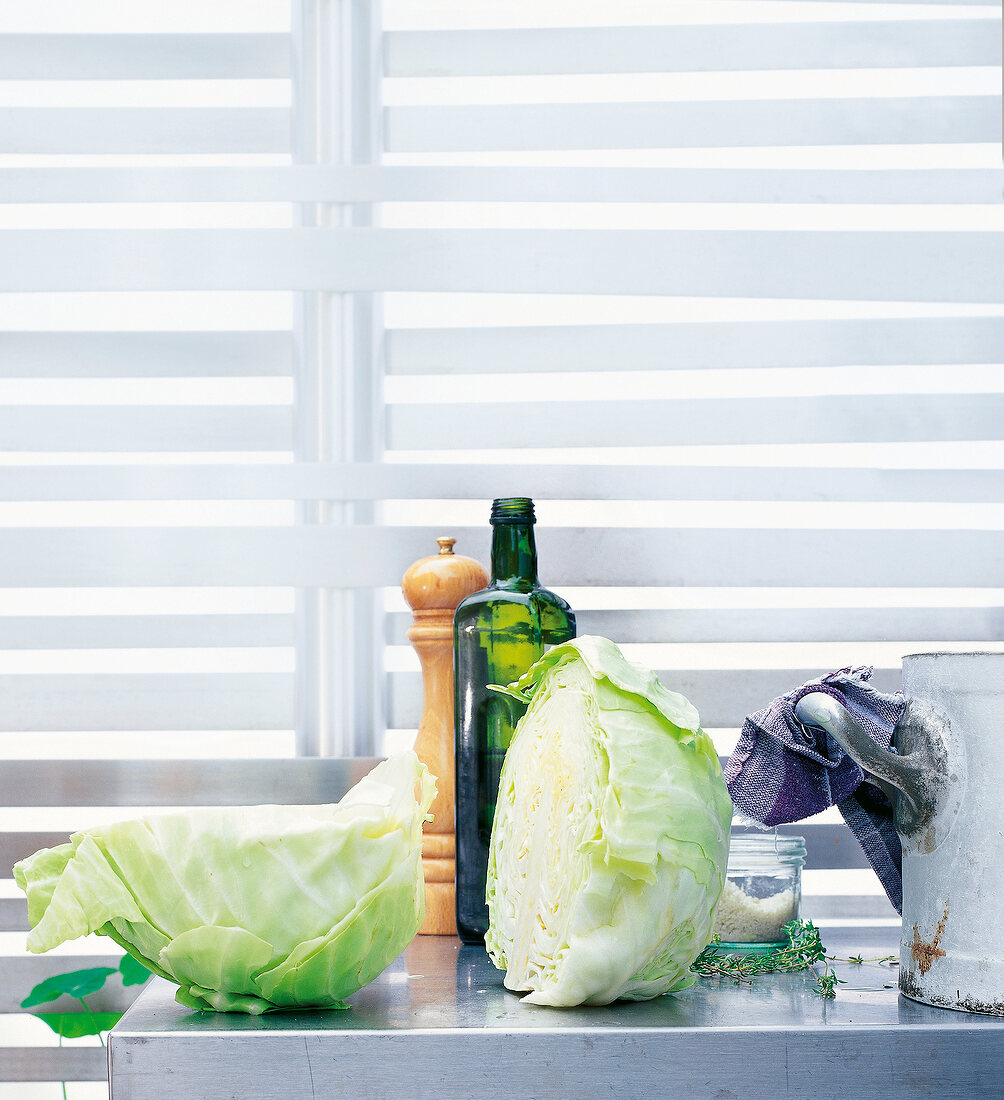 Halved cabbage on table