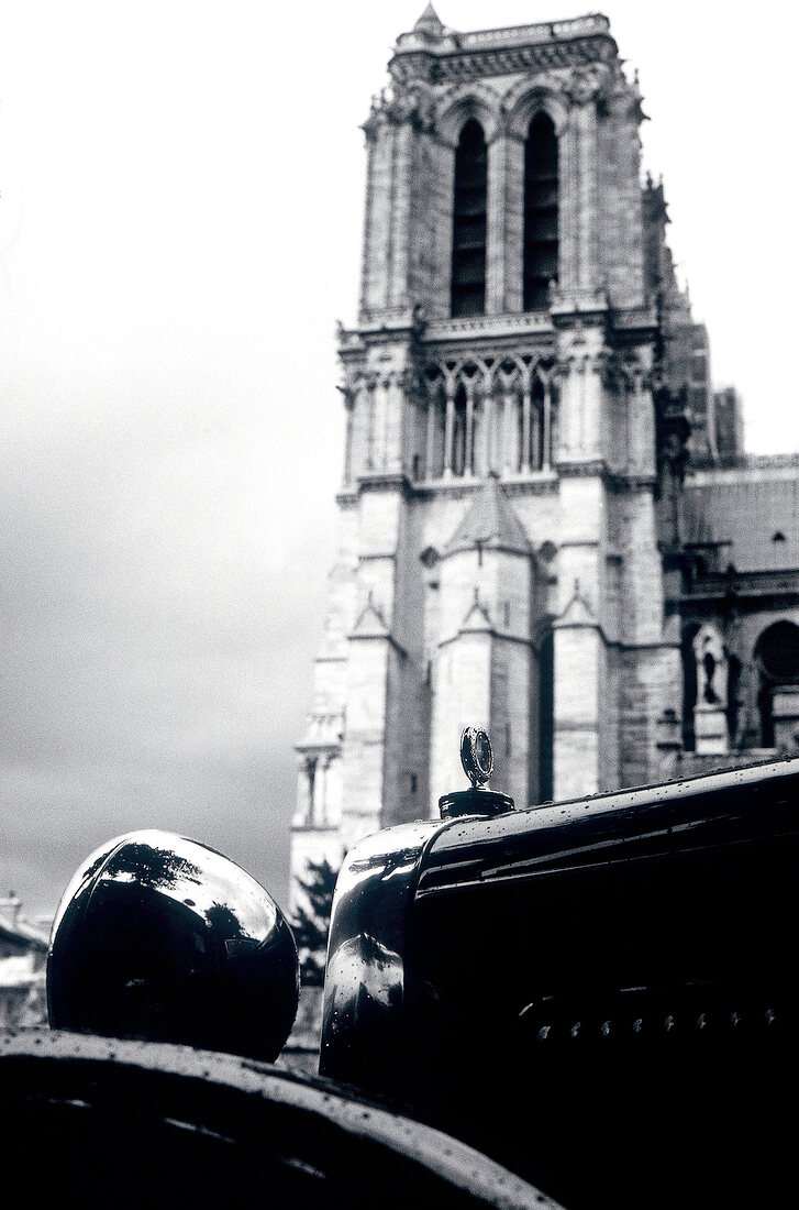 View of Notre Dame Cathedral through a parked car, Paris, France