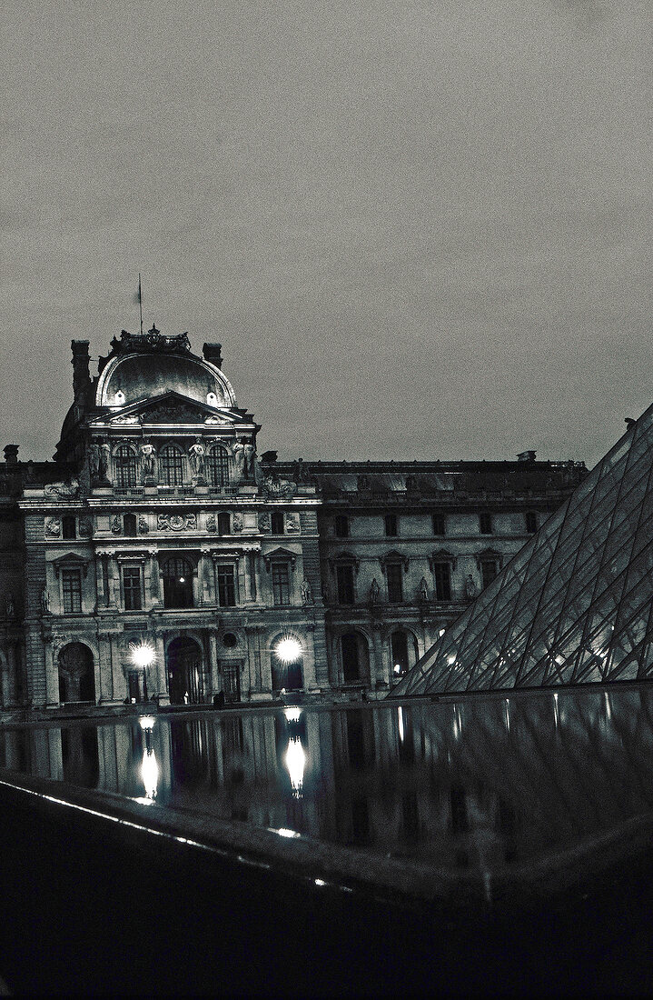 Close-up of illuminated Louvre museum, Paris, France