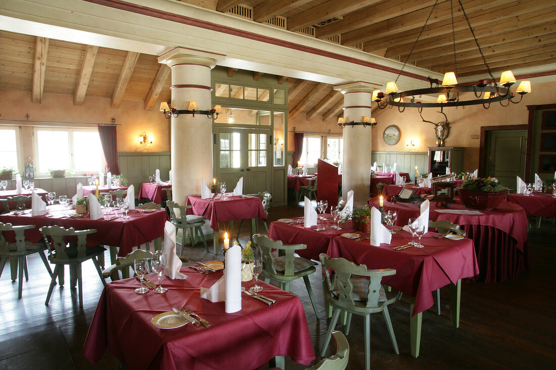 Interior of restaurant with laid tables in Germany