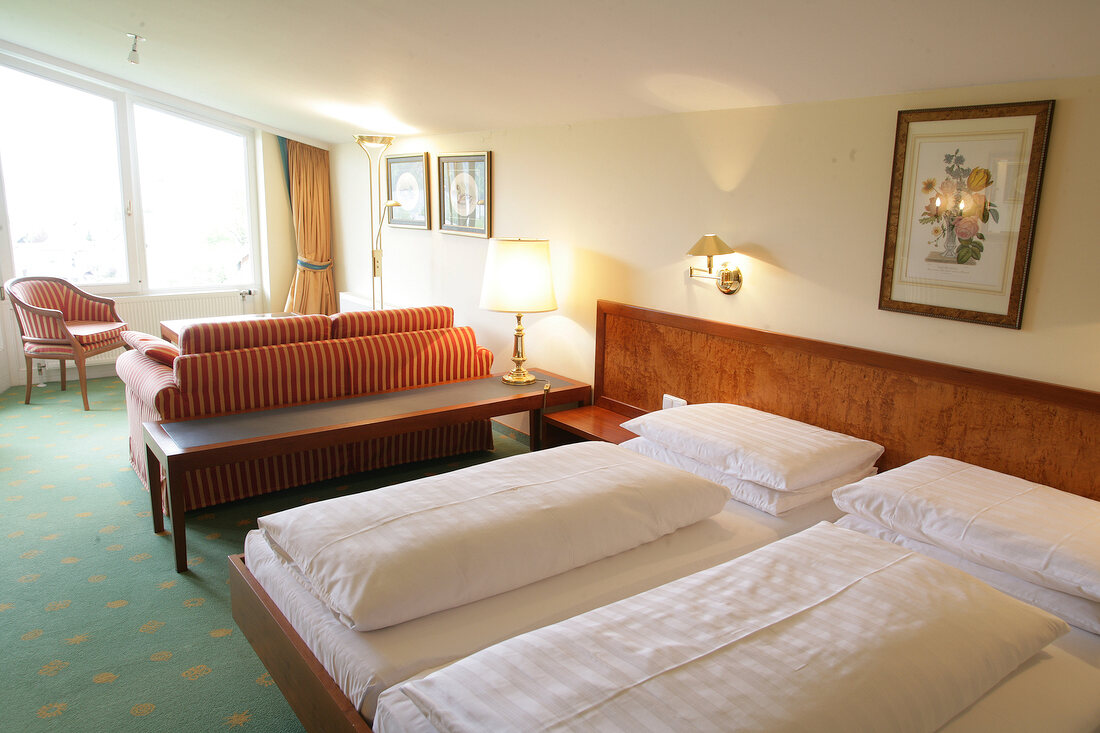 Double bed in the bedroom of Hotel Hollweger, Sankt Gilgen, Salzburg, Austria
