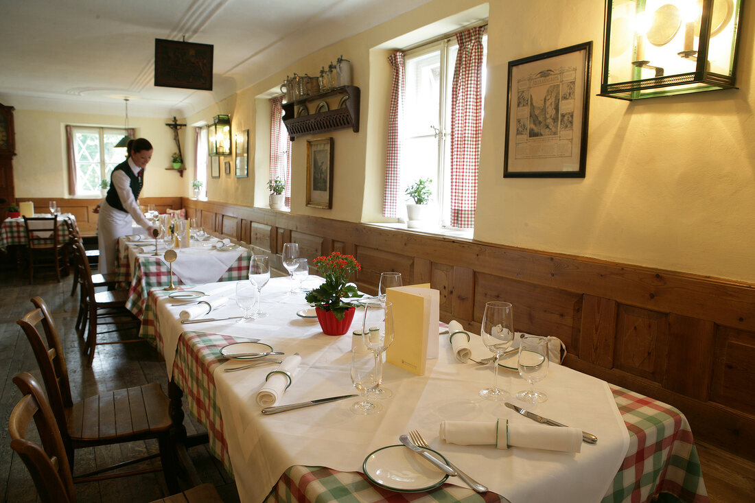 Tables laid in restaurant, Austria