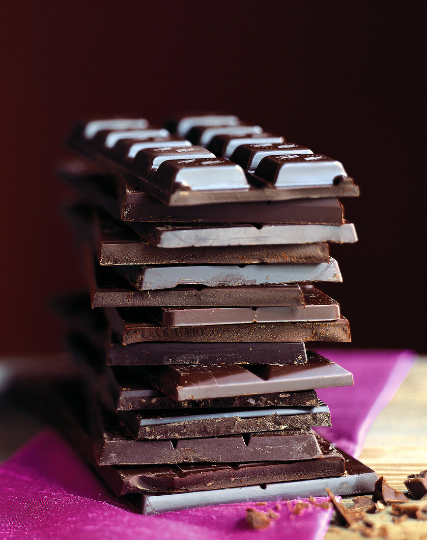 Close-up of several chocolate bars superimposed