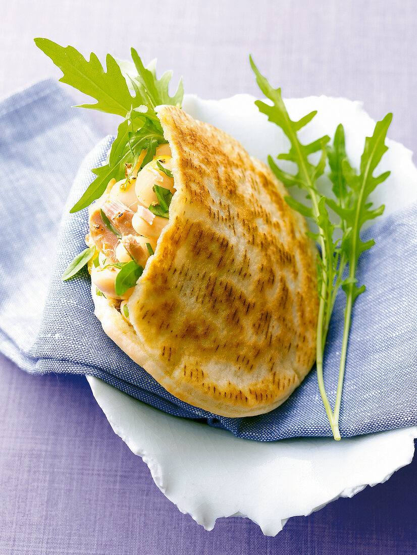 Close-up of pita filled with tuna