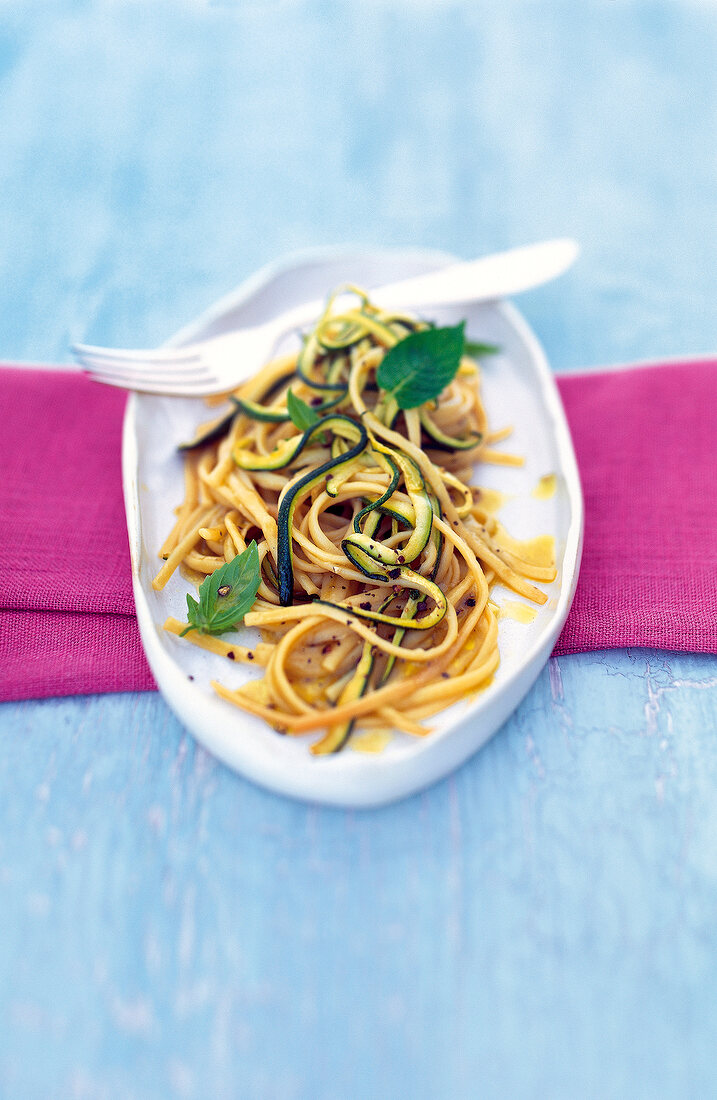 Linguine with zucchini on plate