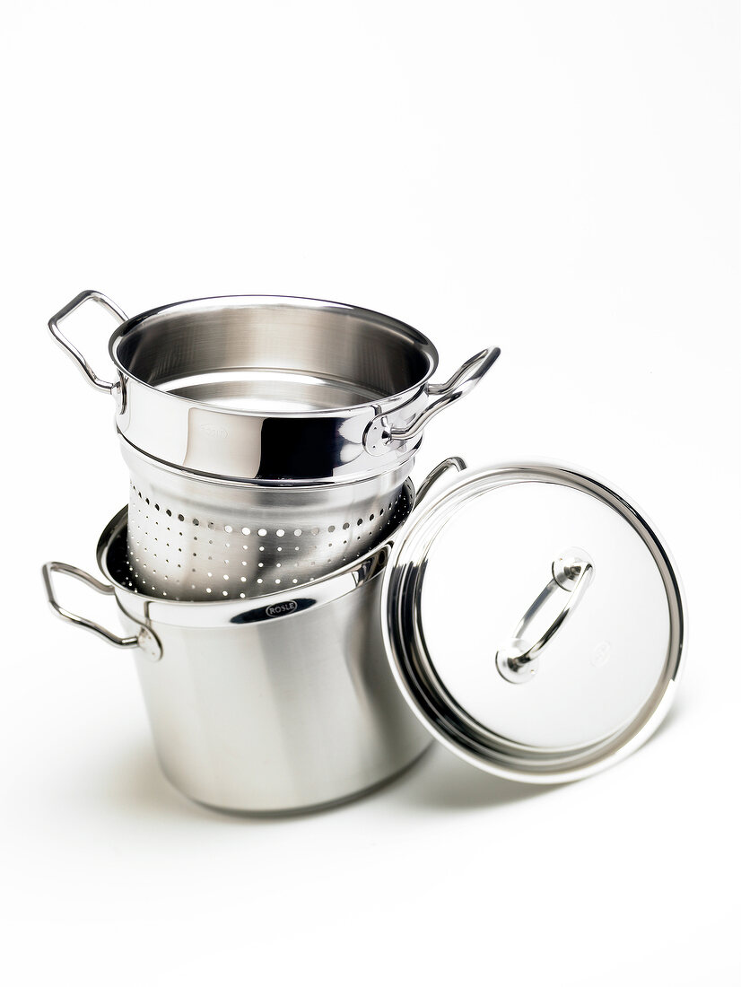 Pasta pot with pasta insert on white background