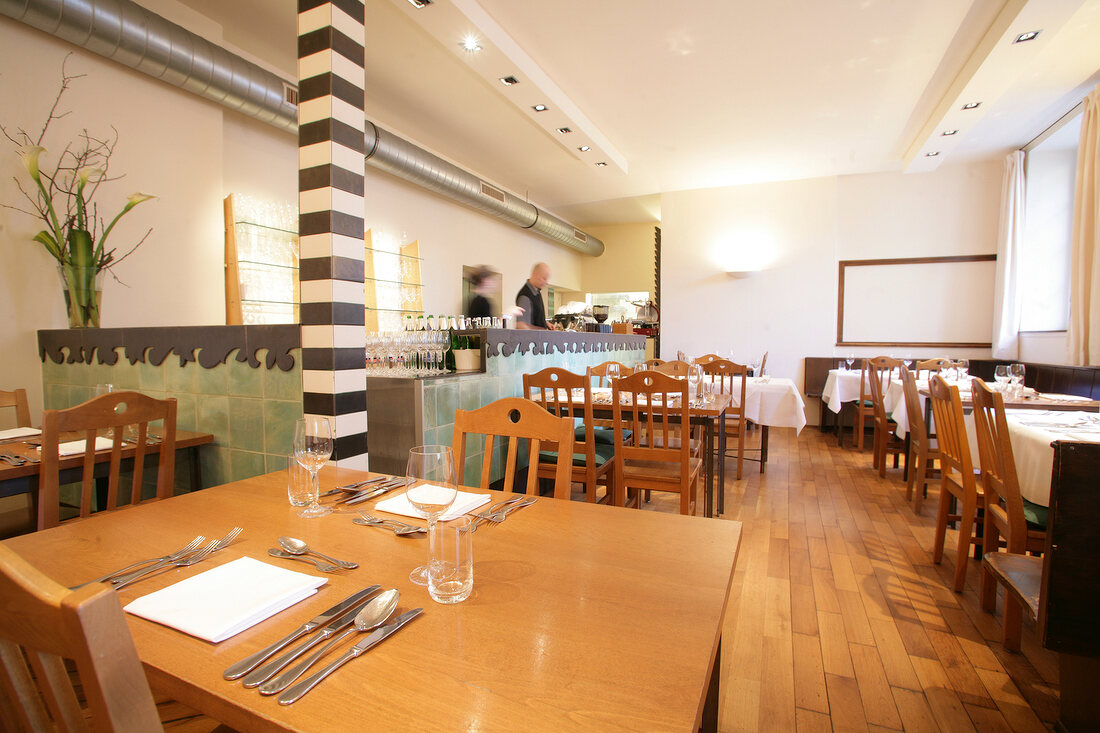 Tables laid in restaurant, Germany