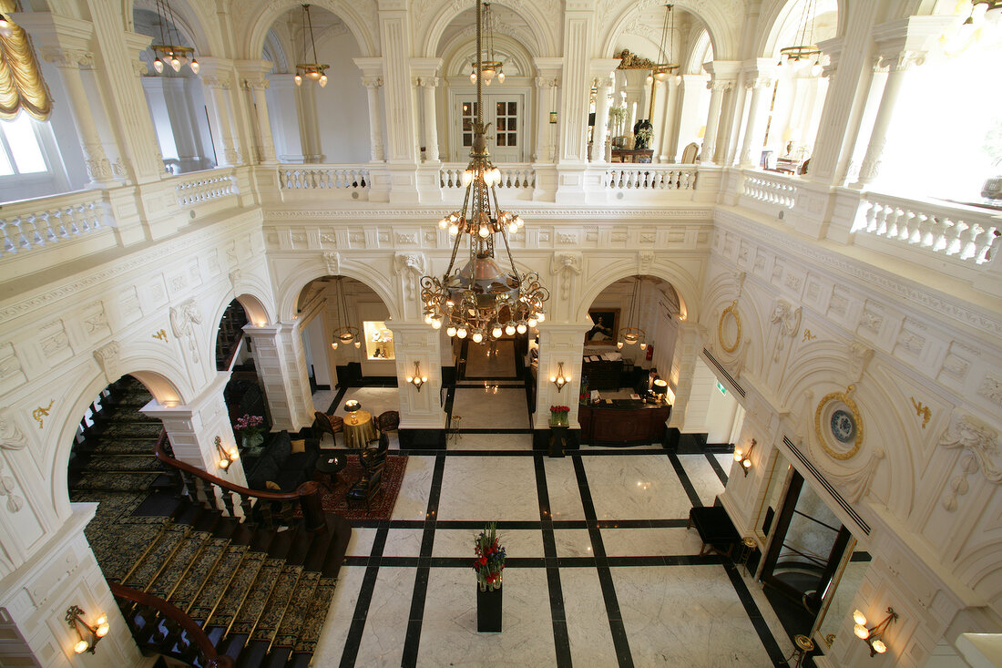 Interior of hall with chandelier in hotel, Netherlands