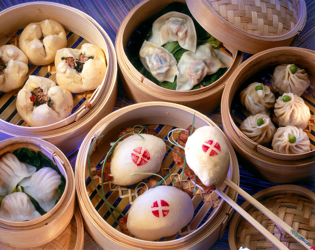 Various types of dumplings stuffed with seafood and meat