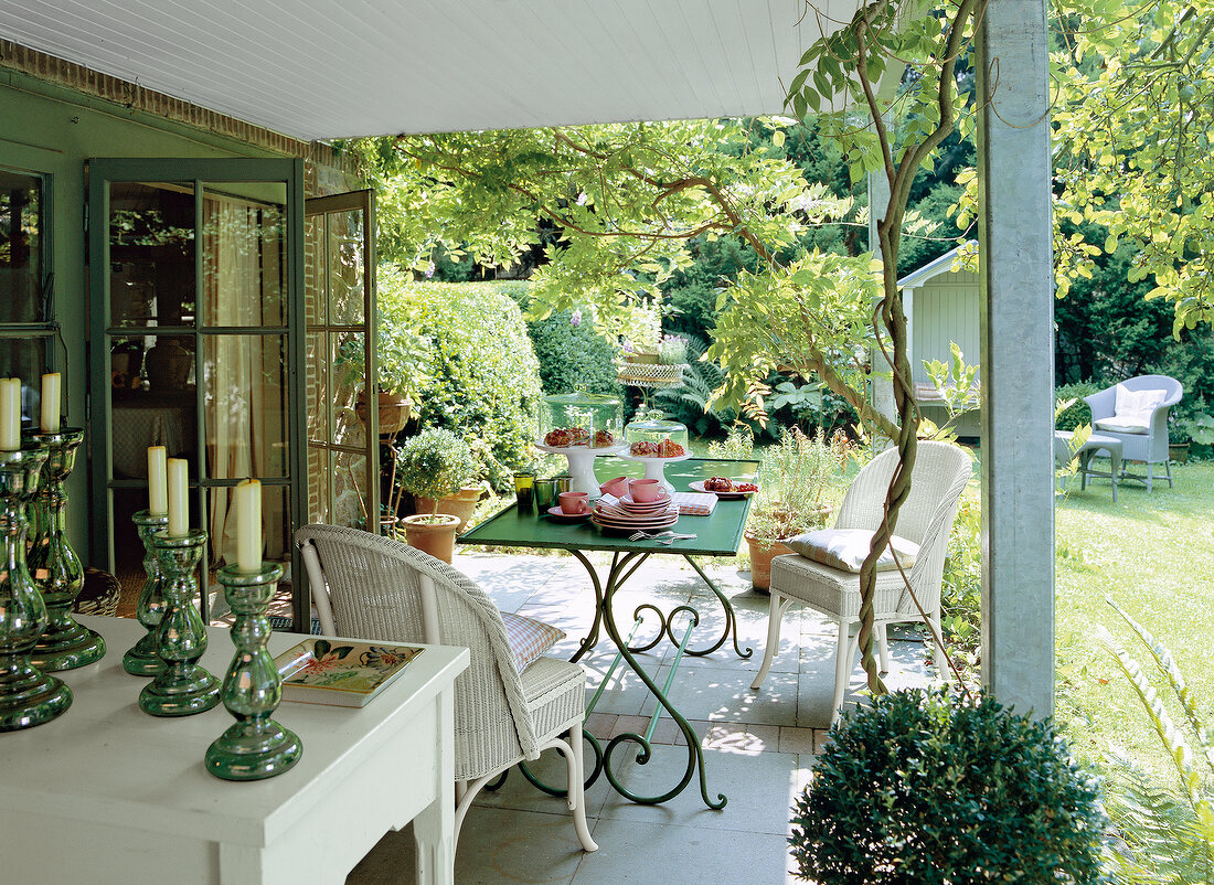 Table and chairs in terrace garden