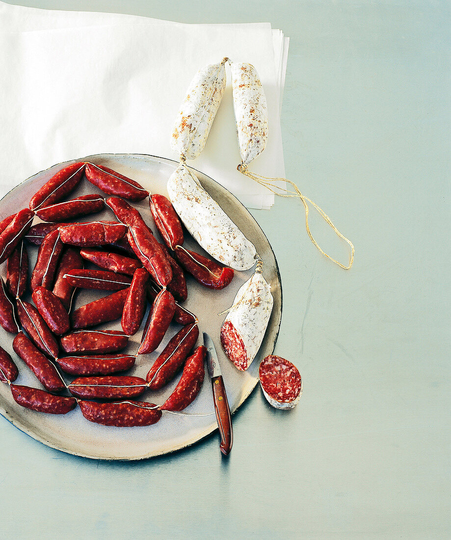 Two different types of salami on plate