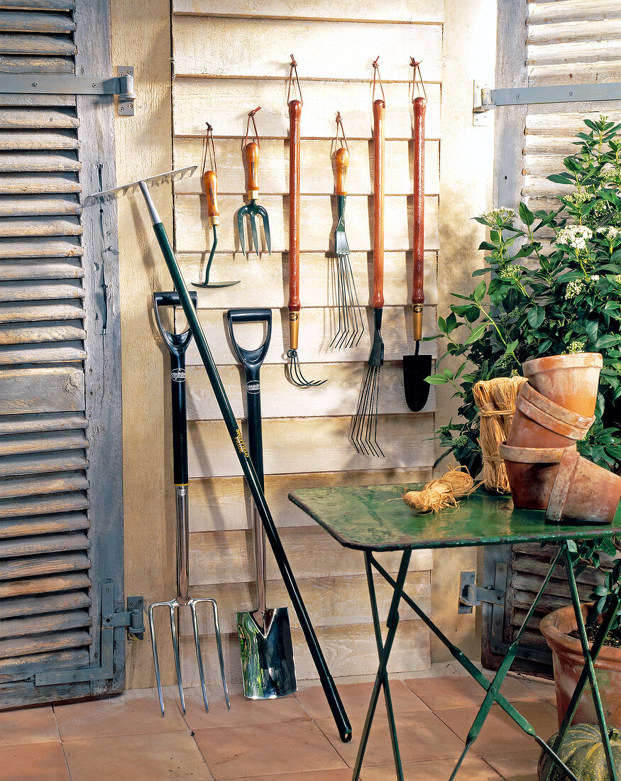 Stainless steel garden appliances on wall in terrace garden