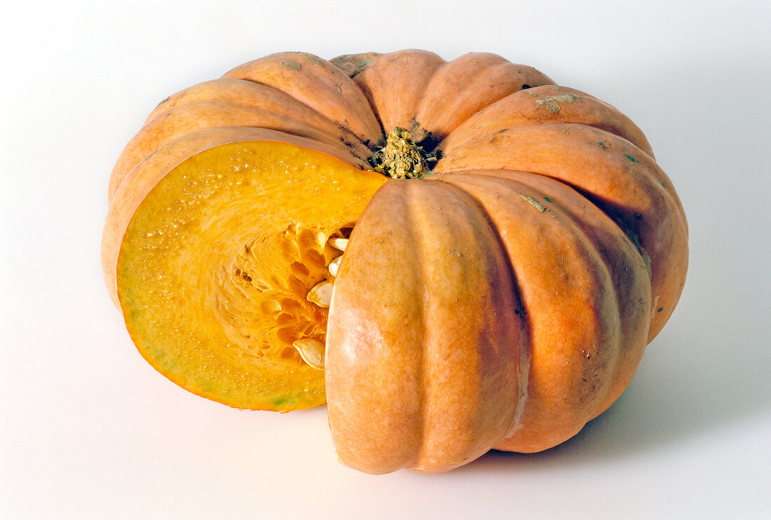 Close-up of cut pumpkin on white background