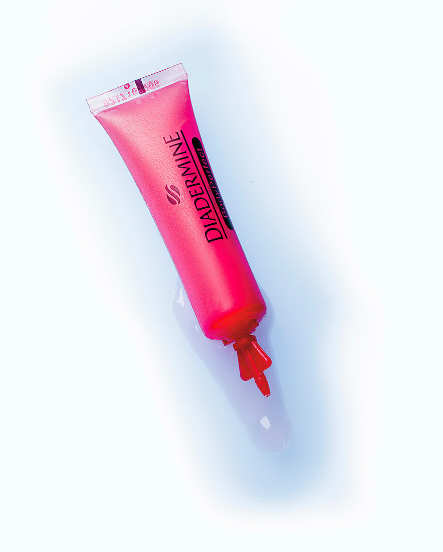 Close-up of cellulite lotion on white background, cosmetic product