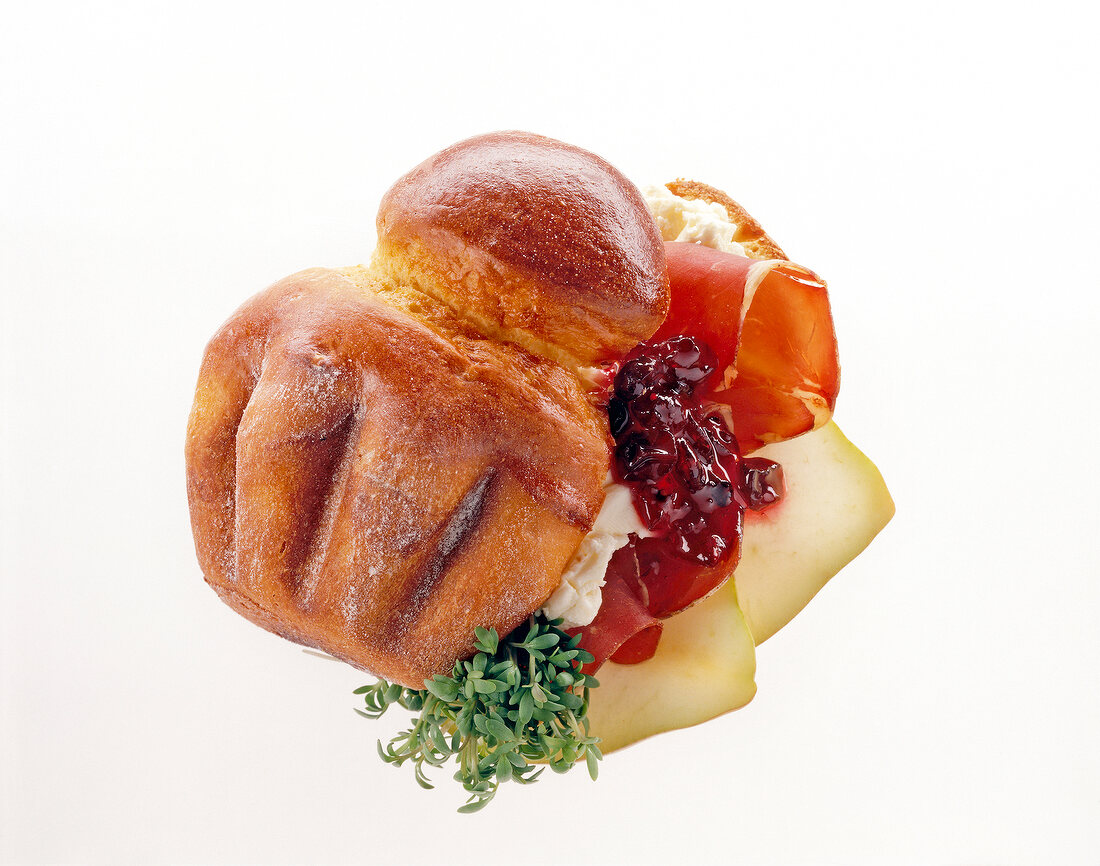 Close-up of stuffed brioche with dried beef and pears