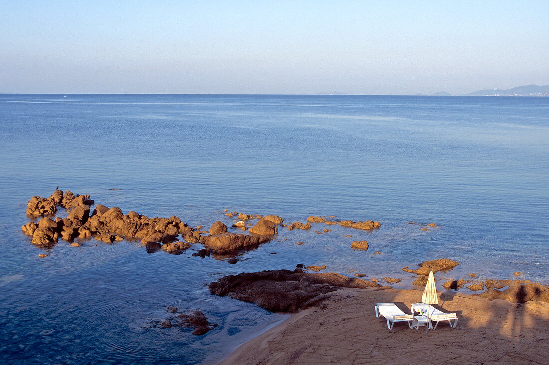 View of Porticcio beach and sea from Hotel Le Maquis in Calvi, Corsica, France
