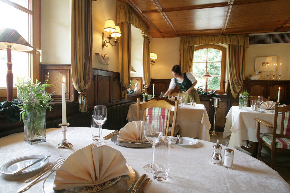 Tables laid in restaurant, Germany