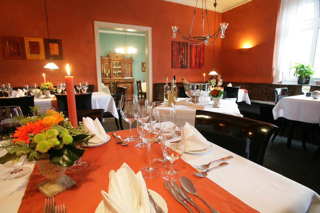 Tables laid in restaurant, Germany