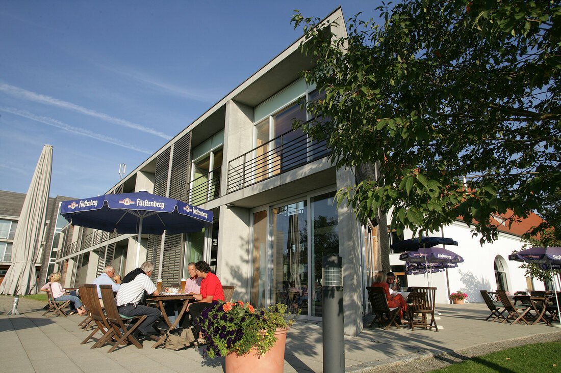 People sitting in a restaurant at Golf and Sports Park in Germany