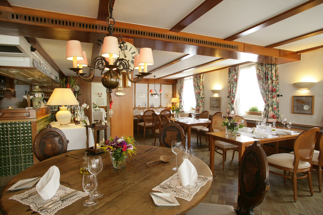 Tables laid in restaurant, Germany