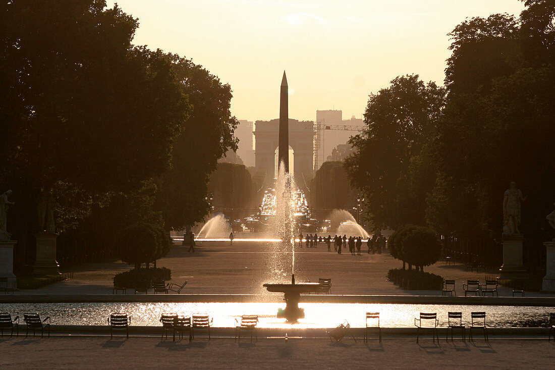 View of fountain and obelisk in Champs-Elysees at dusk, Paris, France
